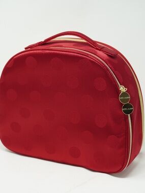 Estee Lauder makeup train case featuring a polka dot pattern